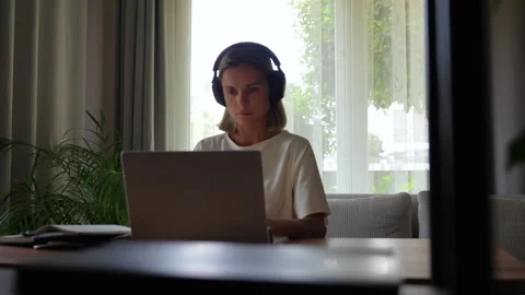 Woman working at home with computer Stock Footage 279849574