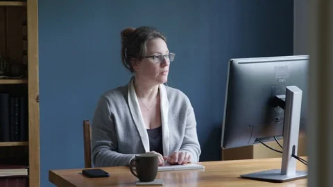 Woman working from home office Stock Footage
