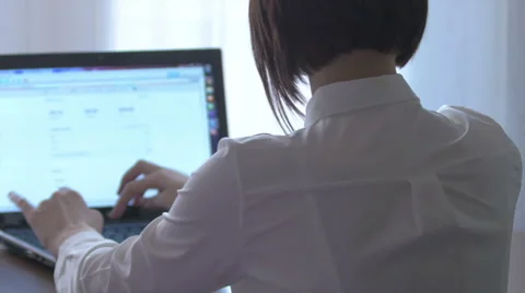 Woman working on laptop 1 Stock Footage