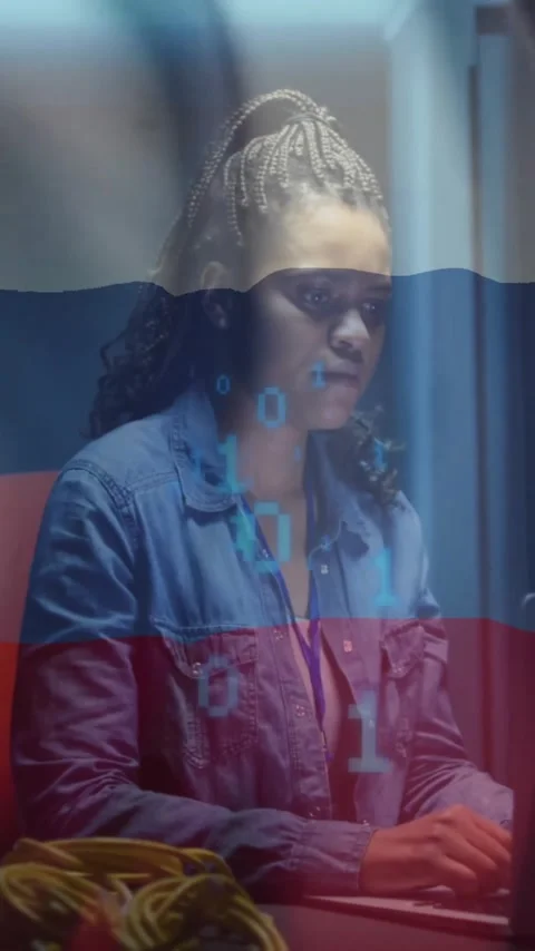 Woman working on laptop with binary code animation over Russian flag Stock Footage 323780920