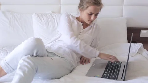 Woman working on laptop Stock Footage