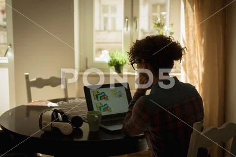 Woman working on laptop Stock Photos