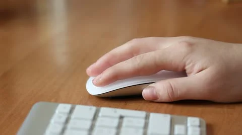 Woman working with mouse Stock Footage 10840295