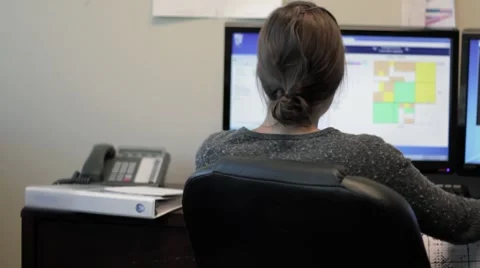 Woman working in office on computer Stock Footage 8359963