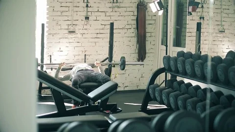 Woman working out lifting weights 4k Stock Footage