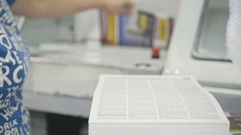 Woman working at polygraph machine, printing industry Stock Footage 67731370