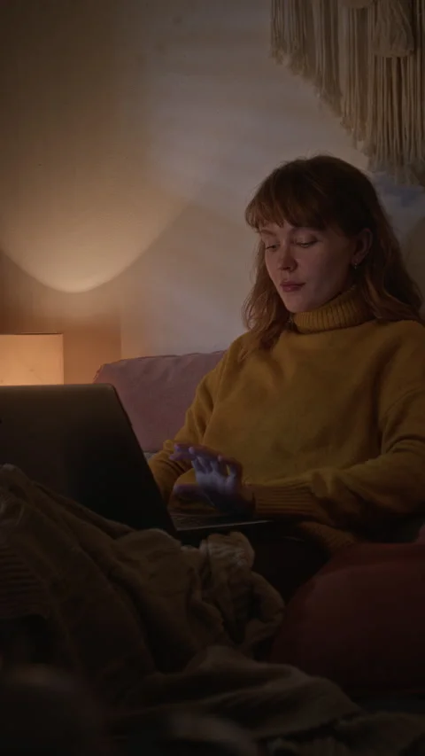 Woman Working Remotely on Laptop Computer Late at Night Stock Footage 341673033