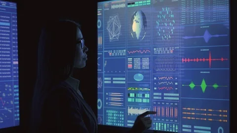 The woman working on sensor display in the dark laboratory Stock Footage 122536836