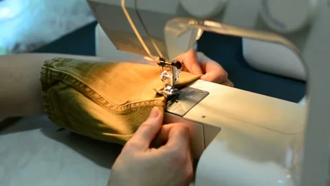 Woman working with sewing machine, Close up HD Clip. Stock Footage 89972609