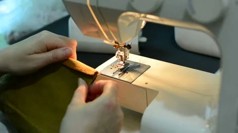 Woman working with sewing machine, Close up HD Clip. Stock Footage 89973645