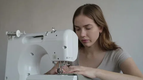 Woman working on the sewing machine Stock Footage 87772234