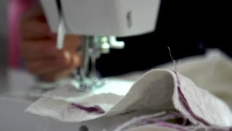 Woman working with sewing machine Stock Footage 157759943