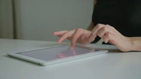 Woman working on tablet computer Stock Footage 46197980