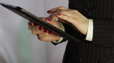 Woman working on a tablet Video stock 47940700