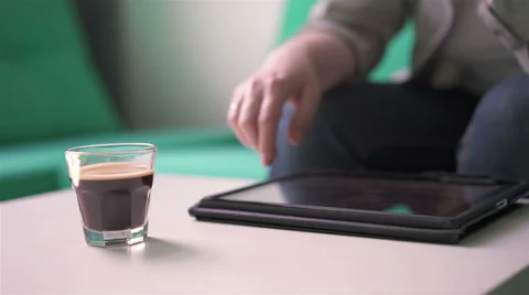 Woman working on a tablet Stock Footage 64390438