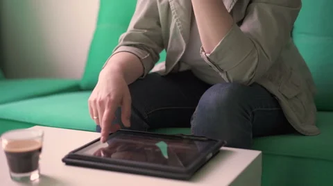 Woman working on a tablet Stock Footage 64390888