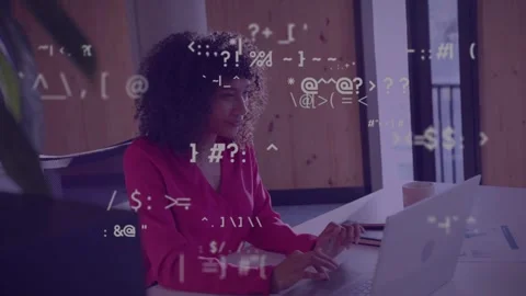 Woman working in tech, typing and using mouse, causing animated code strings Video stock 335466152
