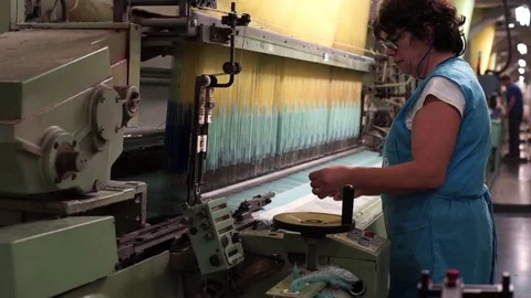 Woman working on a weaving machine. Video stock 72590865