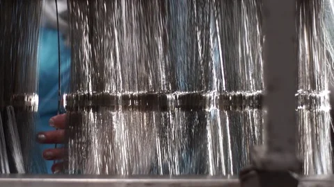 Woman working on a weaving machine. Stock Footage 72595017