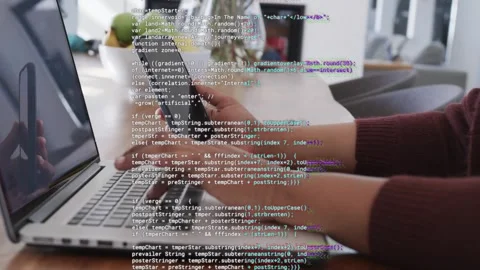 Woman working while typing on laptop and holding phone at dining table, code Stock Footage 333610048