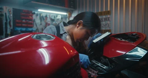 Woman in Workshop Consults Artificial Intelligence Voice Assistant During Stock Footage 330271455