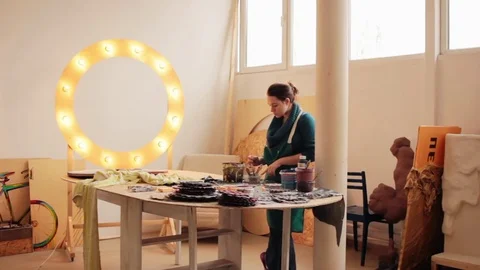 Woman in workshop creating at desktop 스톡 동영상 77902667