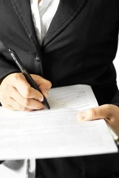 Woman write on document Stock Photos