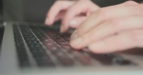 Woman writer typing story on laptop keyb... | Stock Video | Pond5