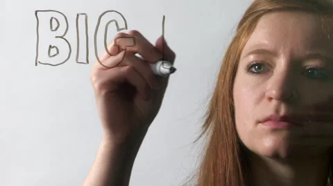 Woman Writes Big Data on a Pane of Glass Stock Footage 61480122