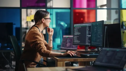 Woman Writes Code On Desktop Computer In Office Stock Footage 223192375