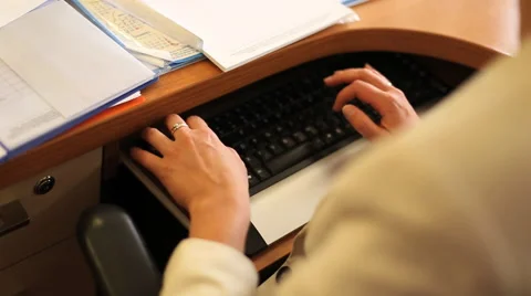 Woman writes on the computer keyboard Stock Footage 41680699