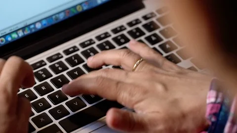 Woman writes on her computer, screen Video stock 76597470