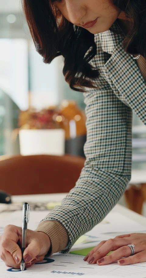Woman, writing and data analysis in office with documents, marketing performance Stock Footage 336774948