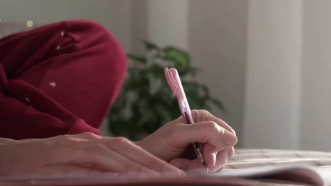 Woman writing in diary. Stock Footage 170238917