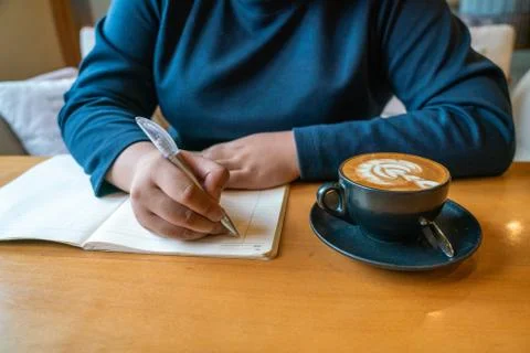 Woman writing notes Stock Photos