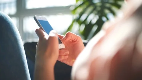 Woman Writing Or Texting With Smartphone At Home Stock Footage