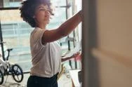 Woman Writing Project Plan On White Board Stock Photos