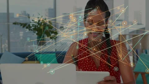 Woman writing on tablet, activating tech network nodes layering over subject, Stock Footage 333078235