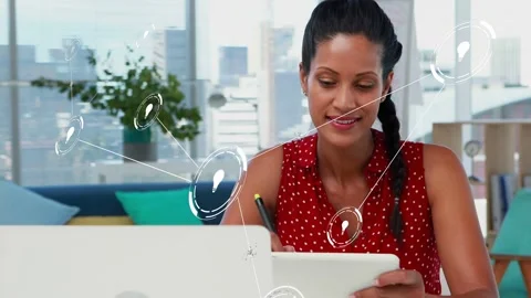 Woman writing tablet while idea nodes appearing left forming tech network Stock Footage 333859811