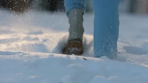 Woman's boots in the snow Stock Footage 231795246