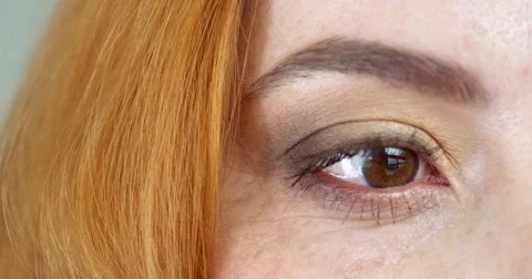 Woman's Brown Eyes Stock Footage 64717271