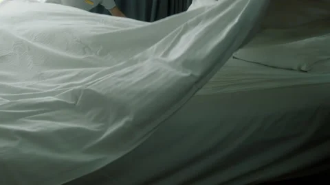 Womans changing the bedding in the room.Employees, two maids of the hotel Stock Footage 205329890