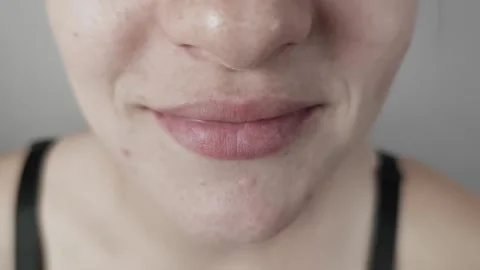 Womans Closed-Lip Smile Macro View Stock Footage 317907697
