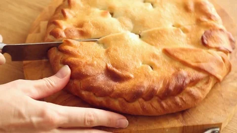 Woman's cutting a pie Video stock 81788633