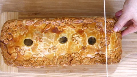 Woman's cutting a pie Stock Footage 88669957