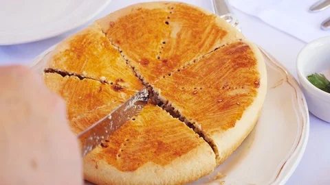 Woman's cutting a pie Stock Footage 103286511