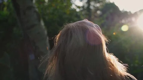 A woman's developing hair in the wind Stock Footage 254353557