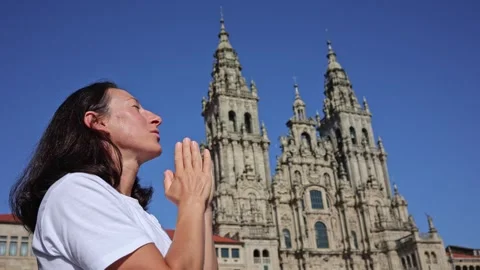 A Woman's Devotion: Seeking Forgiveness by the Christian Temple Stock Footage 256026567