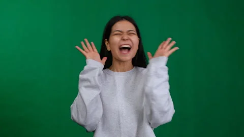 A woman's expression radiates wonder and excitement, a moment of triumph and Stock Footage 264019293