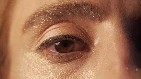 Womans Eye Makeup Closeup Glitter Sparkle Glamour 8 Stock-Footage 112976903